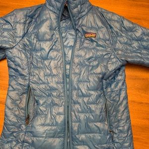 Woman’s Patagonia micro puff.